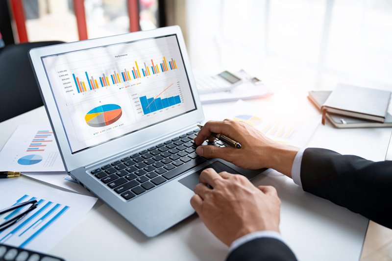 On-page SEO — laptop with analytics and keyword research
